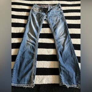 low rise rock revival boot cut jeans
